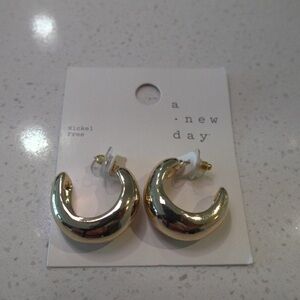 Medium Sized Gold Hoop Earrings. Never Worn. In Original Packaging.